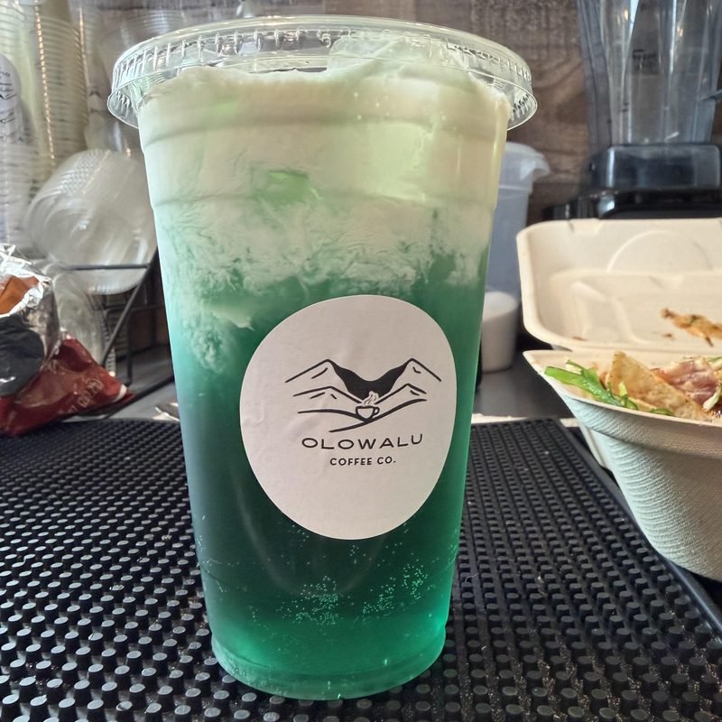 A blue raspberry Red Bull refresher in an Olowalu Coffee Co cup.