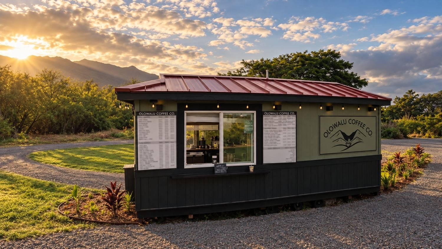 The Olowalu Coffee Co trailer with customers at the window and the West Maui mountains behind it.
