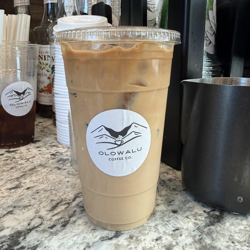 The Westside, an iced latte in an Olowalu Coffee Co cup.